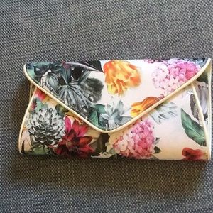 Floral clutch handbag ,vinyl ,never worn